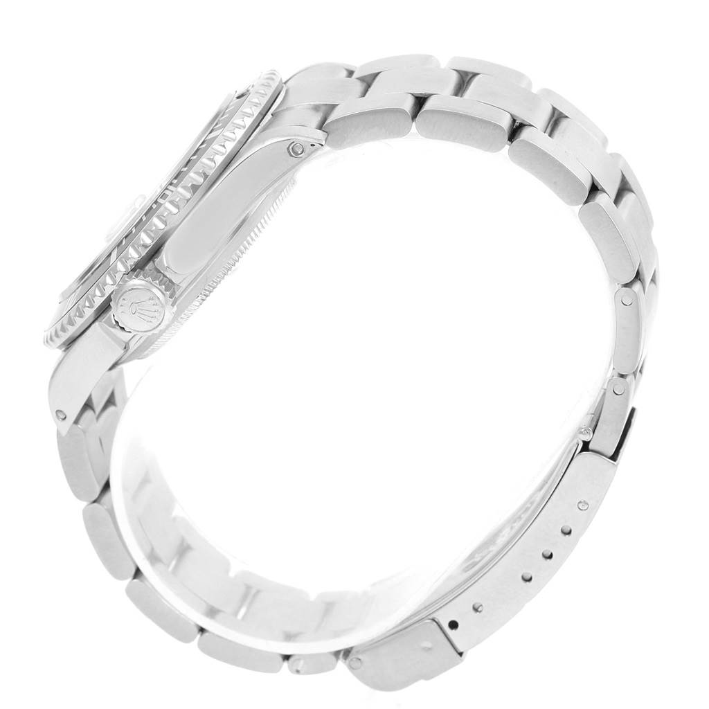 This image shows a side profile of the Rolex Submariner 16610 Men's Stainless Steel Black Dial 16610 Men's Stainless Steel Black Dial watch, highlighting its case, crown, and metal bracelet.