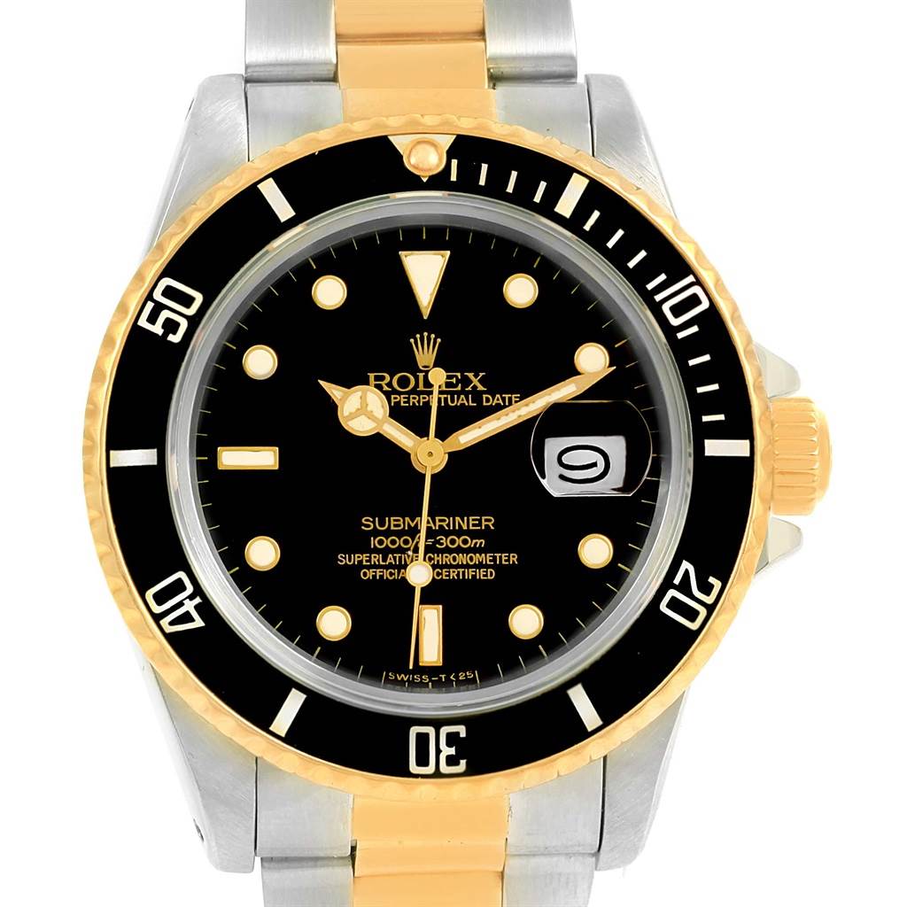 The image shows a front view of a Rolex Submariner 16803 Men
s Steel and Gold (two tone) Black Dial 16803 Men
s Steel and Gold (two tone) Black Dial watch, highlighting the black dial, gold and silver band, and rotating bezel.