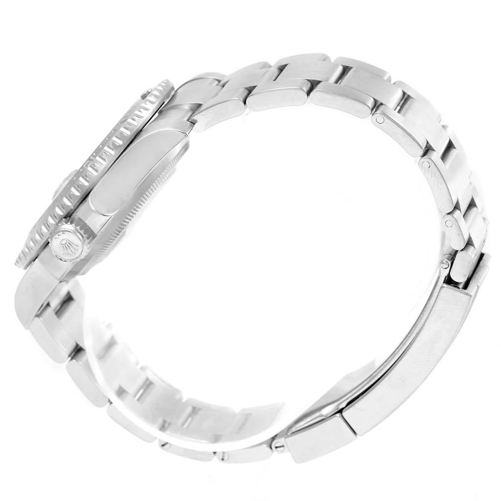 The image shows a side view of a Rolex Submariner 116610 Men's Stainless Steel Black Dial 116610 Men's Stainless Steel Black Dial watch highlighting its crown, bezel, and stainless steel bracelet.