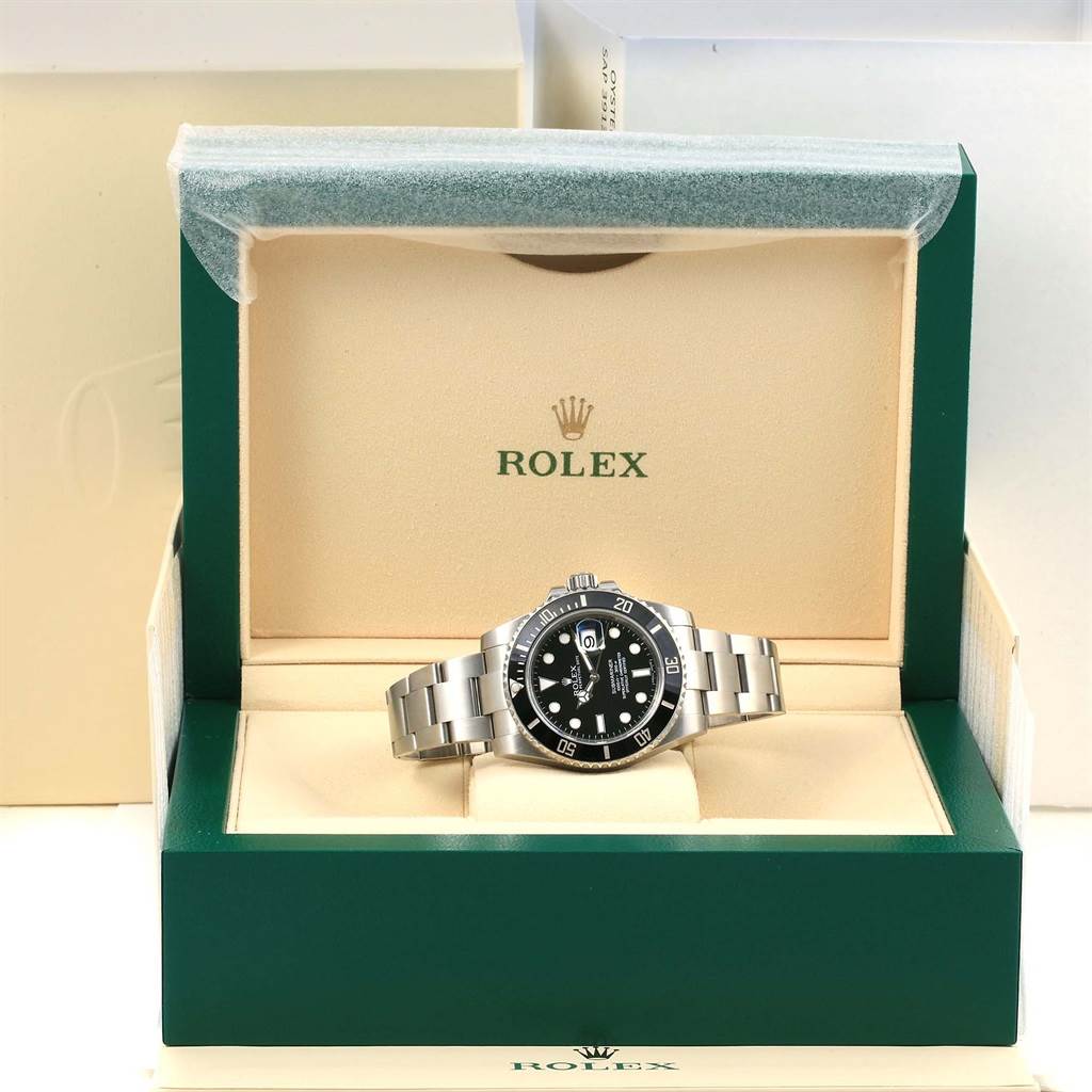 The image shows a Rolex Submariner 116610 Men's Stainless Steel Black Dial 116610 Men's Stainless Steel Black Dial watch from a front view inside its open display box.