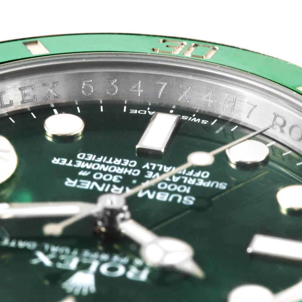 The close-up shot of the Rolex Submariner 116610LV Men's Stainless Steel Green Dial 116610LV Men's Stainless Steel Green Dial shows the dial, partially visible hands, markers, and bezel.