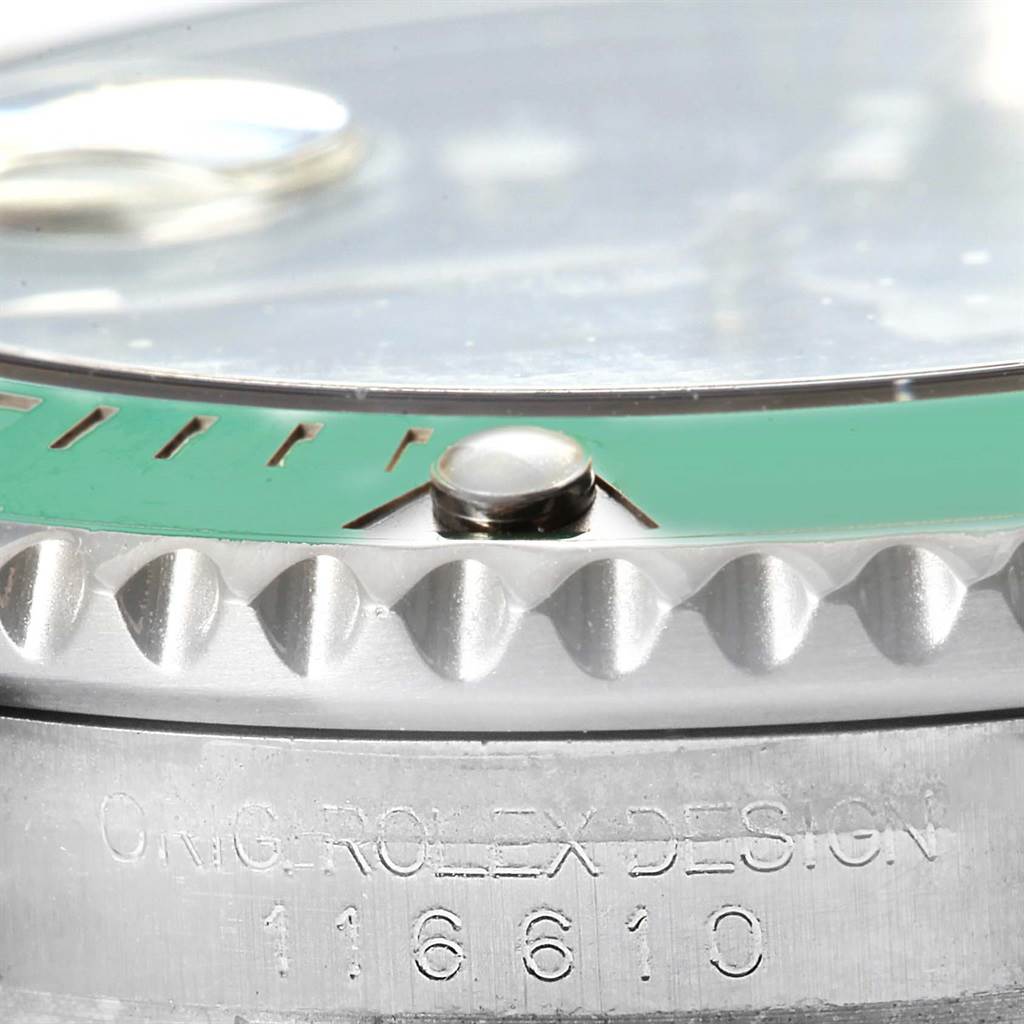 The image shows a close-up of the bezel, crown, and part of the case with serial number engraving of a Rolex Submariner 116610LV Men's Stainless Steel Green Dial 116610LV Men's Stainless Steel Green Dial.