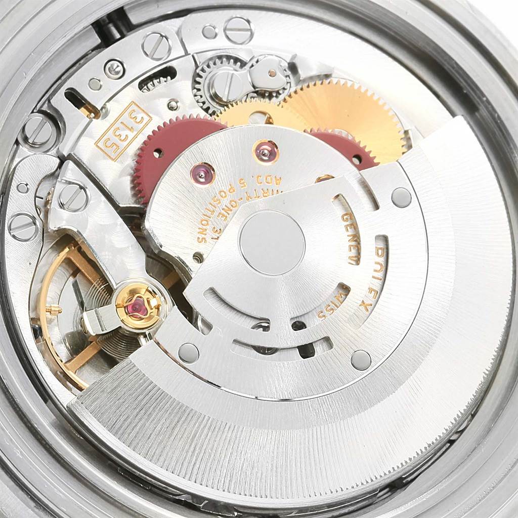 This image shows the intricate internal mechanics and movement of a Rolex Submariner 16610LV Men's Stainless Steel Black Dial 16610LV Men's Stainless Steel Black Dial watch.