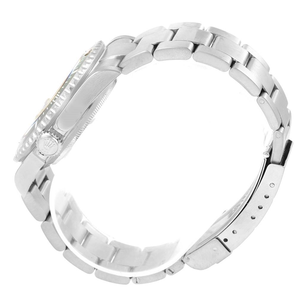 The image shows a side view of a Rolex Submariner 16610LV Men's Stainless Steel Black Dial 16610LV Men's Stainless Steel Black Dial watch, emphasizing its case, crown, bezel, and bracelet.