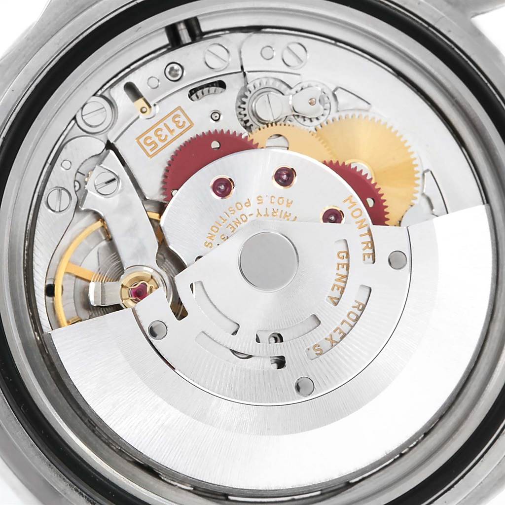 The image shows the internal movement and mechanism of the Rolex Submariner 16610 Men's Stainless Steel Black Dial 16610 Men's Stainless Steel Black Dial watch from the back angle.