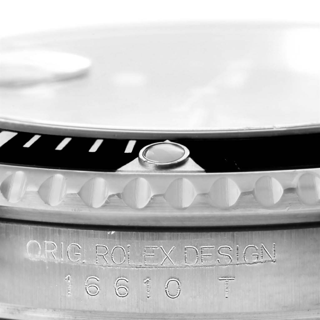 This image shows a close-up view of the bezel, crown, and model engraving of the Rolex Submariner 16610 Men's Stainless Steel Black Dial 16610 Men's Stainless Steel Black Dial 16610.
