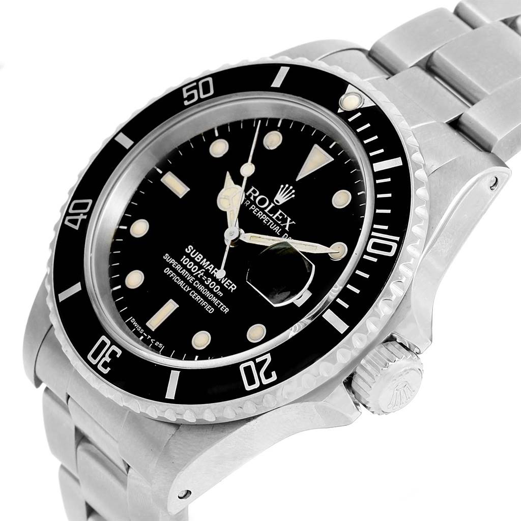 This image shows a close-up angle of a Rolex Submariner 16610 Men's Stainless Steel Black Dial 16610 Men's Stainless Steel Black Dial featuring its dial, bezel, crown, and bracelet.