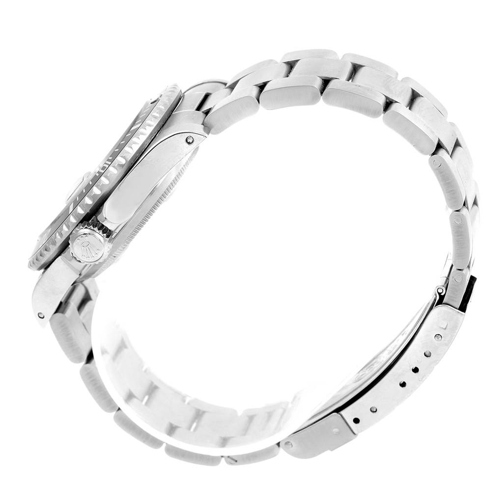 The image shows the side profile of a Rolex Submariner 16610 Men's Stainless Steel Black Dial 16610 Men's Stainless Steel Black Dial watch, highlighting the bracelet and the crown.