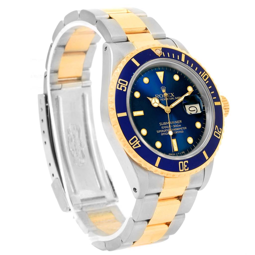 The Rolex Submariner 16803 Men's Steel and Gold (two tone) Blue Dial 16803 Men's Steel and Gold (two tone) Blue Dial watch is shown at an angled view, highlighting its blue dial, bezel, and two-tone metal bracelet.