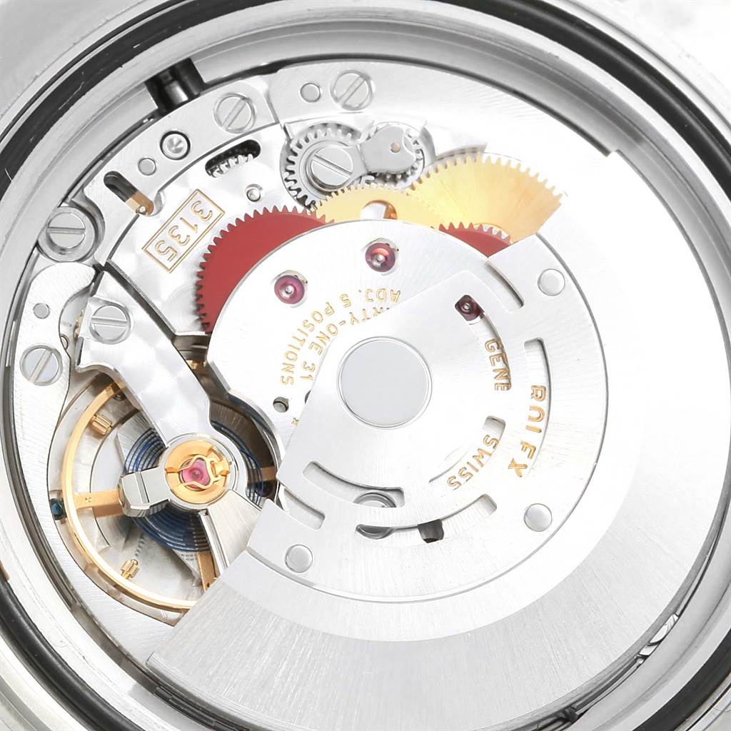 The image shows a close-up view of the movement and internal mechanism of a Rolex Submariner 116610 Men's Stainless Steel Black Dial 116610 Men's Stainless Steel Black Dial watch.