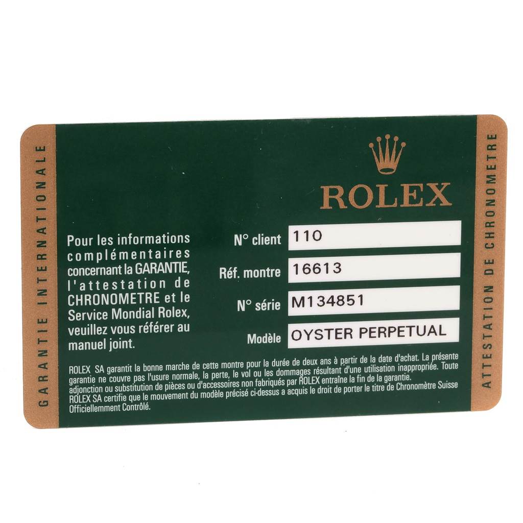 The image shows a warranty card for a Rolex Submariner 16613 Men's Steel and Gold (two tone) Champagne Dial 16613 Men's Steel and Gold (two tone) Champagne Dial model Oyster Perpetual.