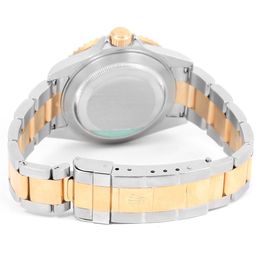 The image shows the back view of the Rolex Submariner 16613 Men's Steel and Gold (two tone) Champagne Dial 16613 Men's Steel and Gold (two tone) Champagne Dial watch, highlighting its two-tone bracelet and clasp.
