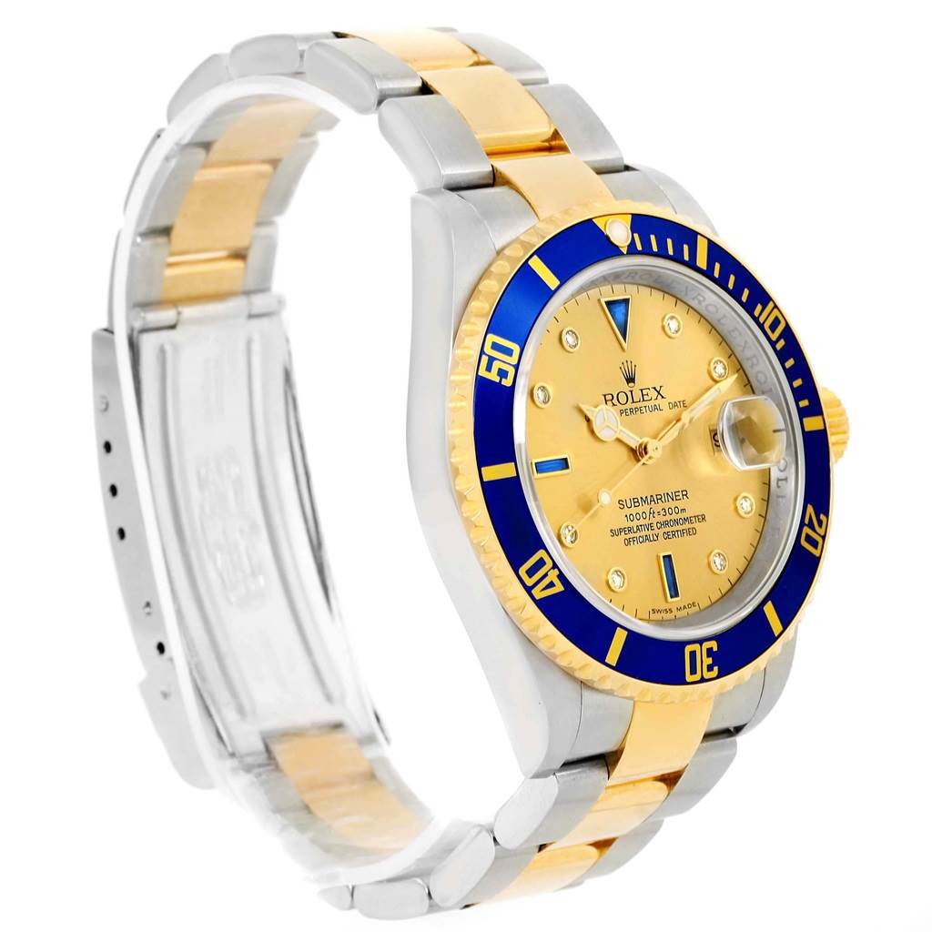 This image shows a side angle of the Rolex Submariner 16613 Men's Steel and Gold (two tone) Champagne Dial 16613 Men's Steel and Gold (two tone) Champagne Dial watch, highlighting its two-tone bracelet and blue bezel.