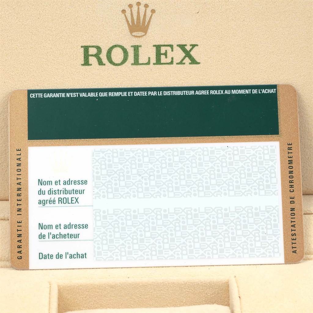 The image shows a guarantee card for the Rolex Submariner 114060 Men's Stainless Steel Black Dial 114060 Men's Stainless Steel Black Dial model, with the Rolex logo visible in the background.