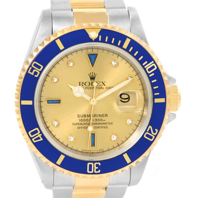 The image shows a Rolex Submariner 16613 Men's Steel and Gold (two tone) Champagne Dial 16613 Men's Steel and Gold (two tone) Champagne Dial watch from a front angle, highlighting the dial, bezel, and part of the bracelet.