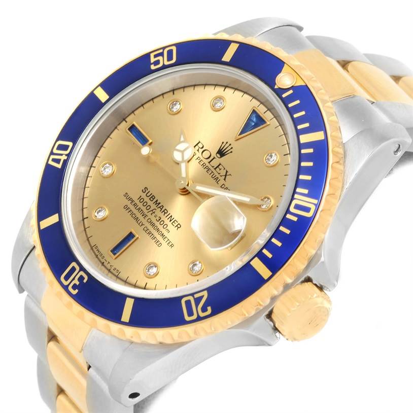 This image shows a Rolex Submariner 16613 Men's Steel and Gold (two tone) Champagne Dial 16613 Men's Steel and Gold (two tone) Champagne Dial watch at an angled view, highlighting the dial, bezel, and bracelet.