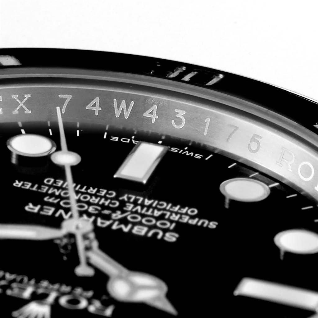 This close-up image shows the dial, hands, and inner bezel with engravings of the Rolex Submariner 116610 Men's Stainless Steel Black Dial 116610 Men's Stainless Steel Black Dial watch.