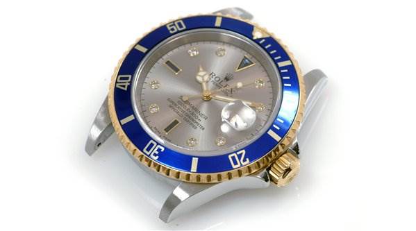The image shows a Rolex Submariner 16613 Men's Stainless Steel Grey Dial 16613 Men's Stainless Steel Grey Dial watch from a slightly angled top view, highlighting its blue bezel, face, and crown.