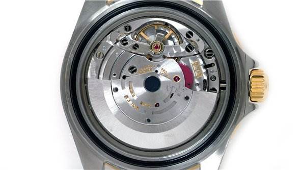The image shows the back of a Rolex Submariner 16613 Men's Stainless Steel Grey Dial 16613 Men's Stainless Steel Grey Dial watch, highlighting its internal mechanical movement.
