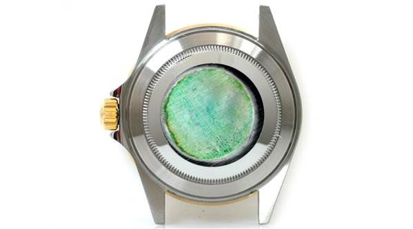 The image shows the back case and part of the crown of a Rolex Submariner 16613 Men's Stainless Steel Grey Dial 16613 Men's Stainless Steel Grey Dial watch from a rear view angle.