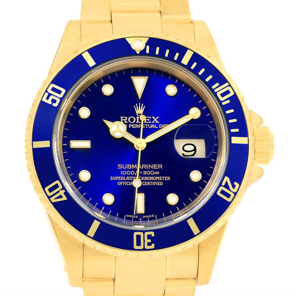 The image shows a front view of the Rolex Submariner 16618 Men's Yellow Gold Blue Dial 16618 Men's Yellow Gold Blue Dial watch, highlighting its blue dial, date window, and gold bracelet.