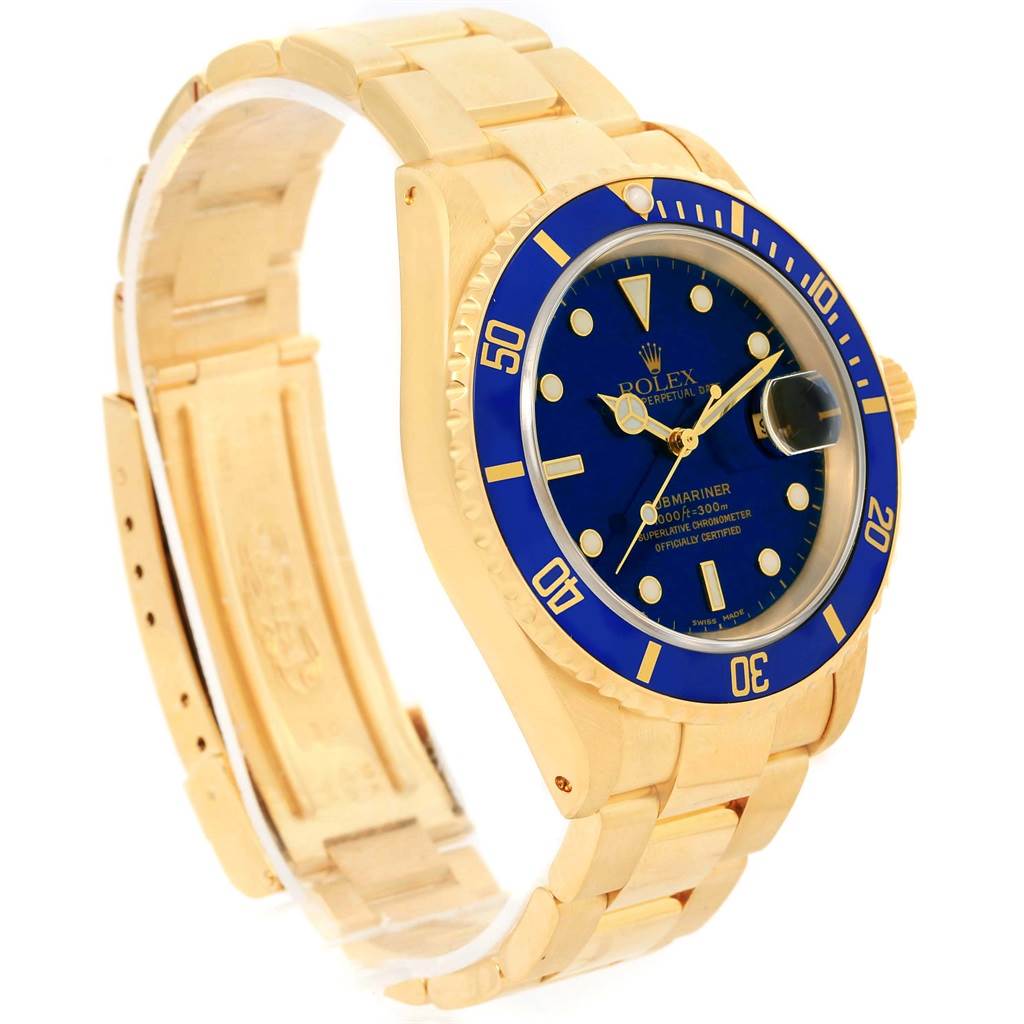 This image shows a side view of a Rolex Submariner 16618 Men's Yellow Gold Blue Dial 16618 Men's Yellow Gold Blue Dial watch, displaying the face, bezel, bracelet, and clasp.