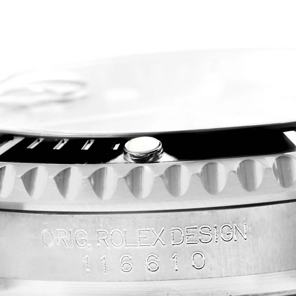 The image shows a close-up of the bezel, crown, and engraved text on a Rolex Submariner 116610 Men's Stainless Steel Black Dial 116610 Men's Stainless Steel Black Dial watch.