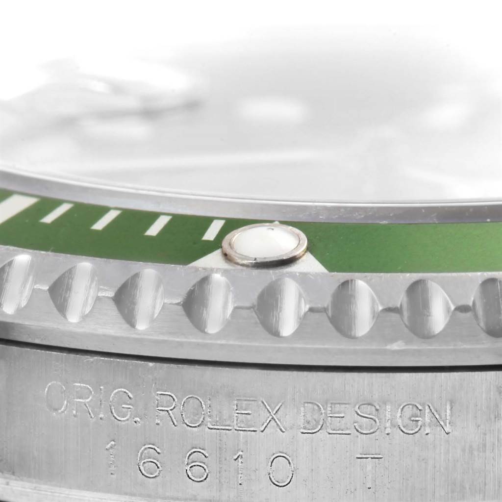 This close-up image of the Rolex Submariner 16610LV Men's Stainless Steel Black Dial 16610LV Men's Stainless Steel Black Dial watch shows a detailed view of the bezel, crown, and engraved model number "16610."