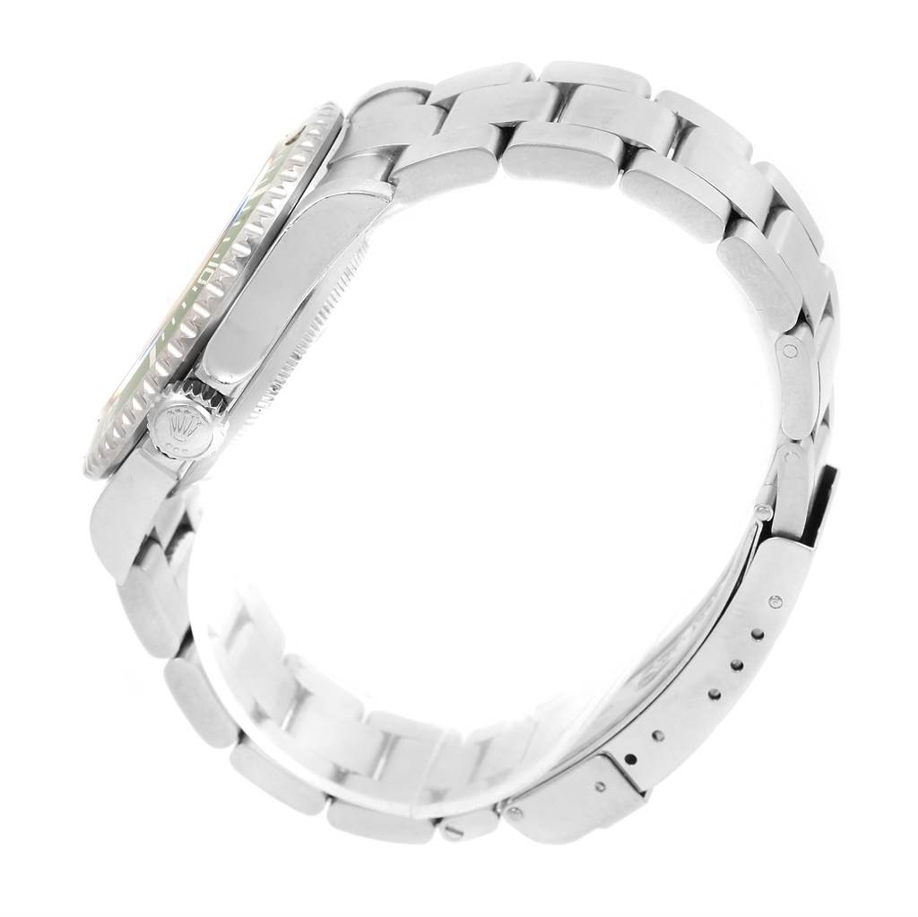 This image shows a side view of the Rolex Submariner 16610LV Men's Stainless Steel Black Dial 16610LV Men's Stainless Steel Black Dial watch, highlighting the case, crown, and bracelet.