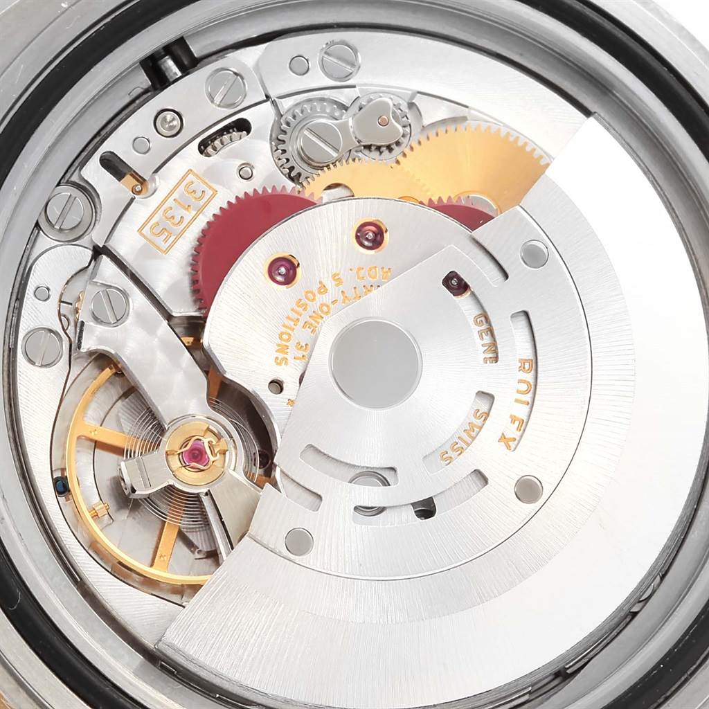 This is a close-up view of the movement mechanism inside a Rolex Submariner 16613 Men's Stainless Steel Black Dial 16613 Men's Stainless Steel Black Dial watch.
