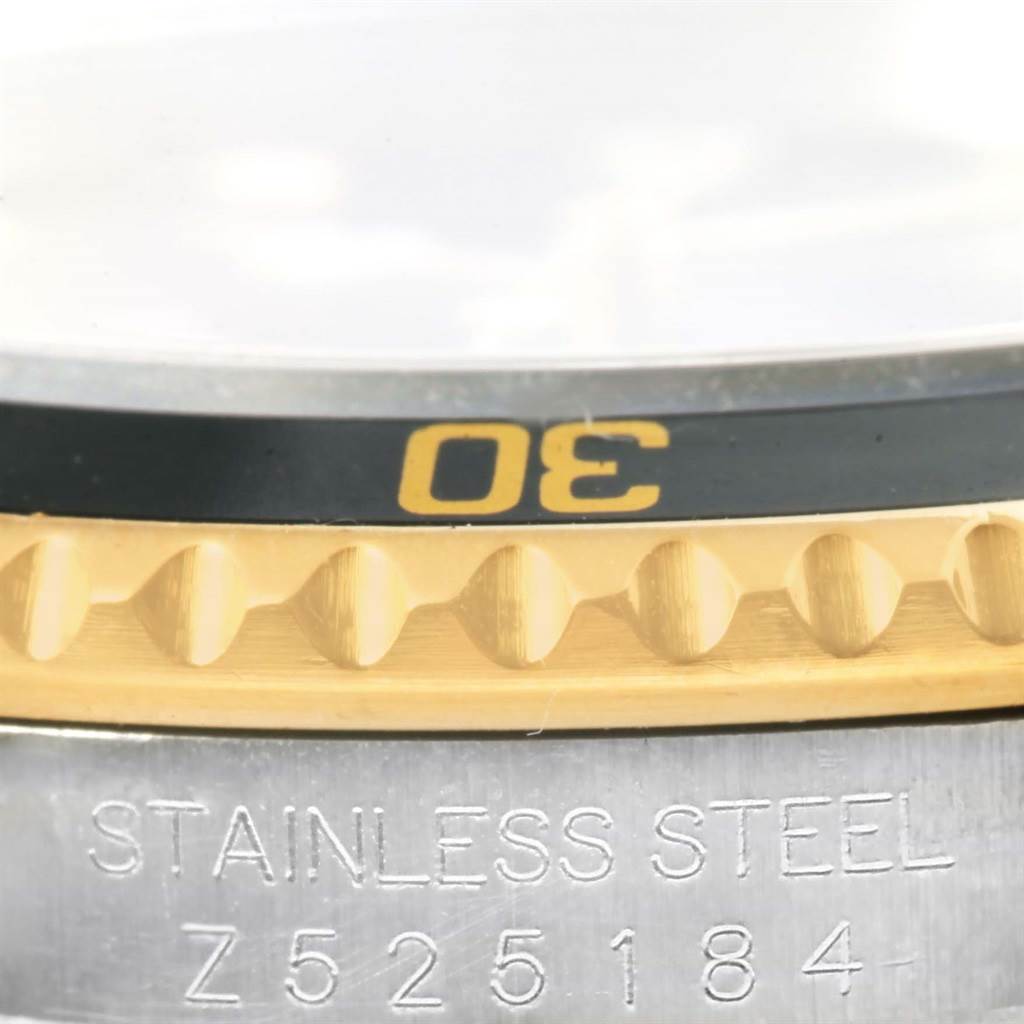 This close-up image shows the bezel and part of the casing, specifically highlighting the number "30" on the Rolex Submariner 16613 Men's Stainless Steel Black Dial 16613 Men's Stainless Steel Black Dial watch.