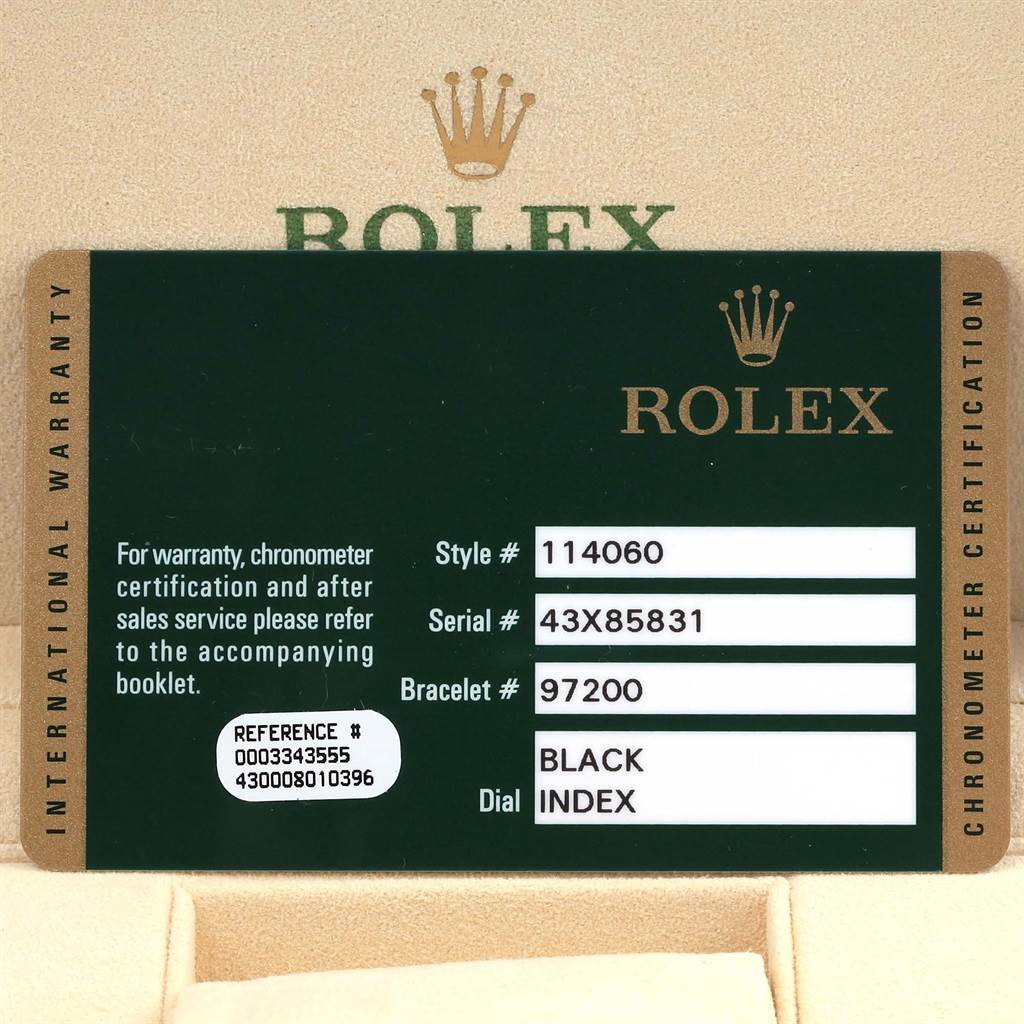 The image shows the warranty card for a Rolex Submariner 114060 Men's Stainless Steel Black Dial 114060 Men's Stainless Steel Black Dial watch, displaying style, serial, bracelet numbers, and dial information.