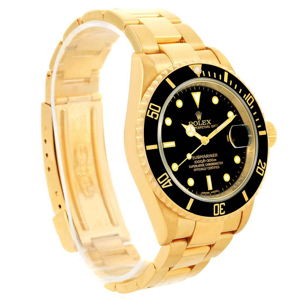 The image shows a side angle of a Rolex Submariner 16618 Men's Yellow Gold Black Dial 16618 Men's Yellow Gold Black Dial watch, highlighting its gold band, bezel, and black dial.