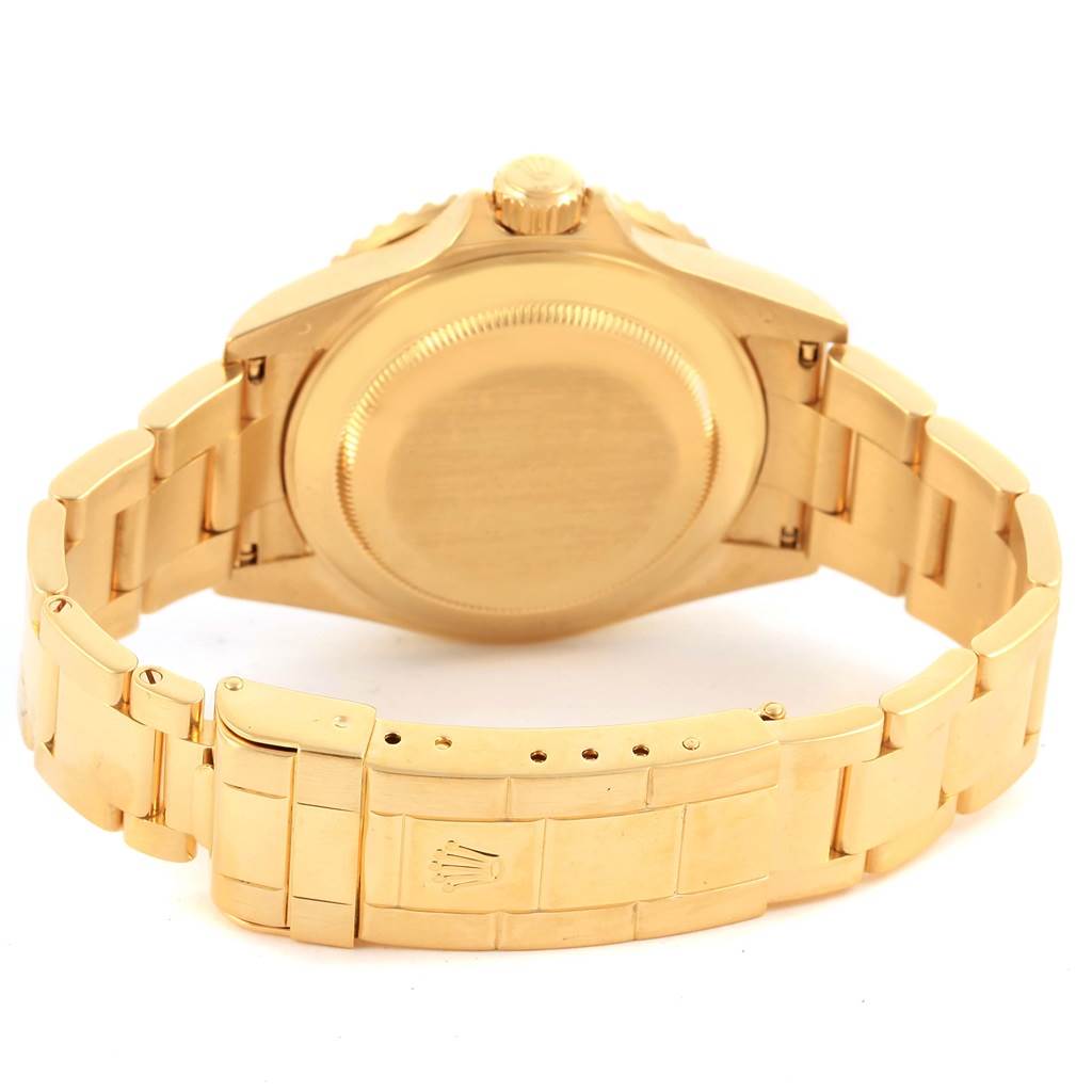 The image shows the back case and bracelet of a Rolex Submariner 16618 Men's Yellow Gold Black Dial 16618 Men's Yellow Gold Black Dial watch, viewed from the rear.