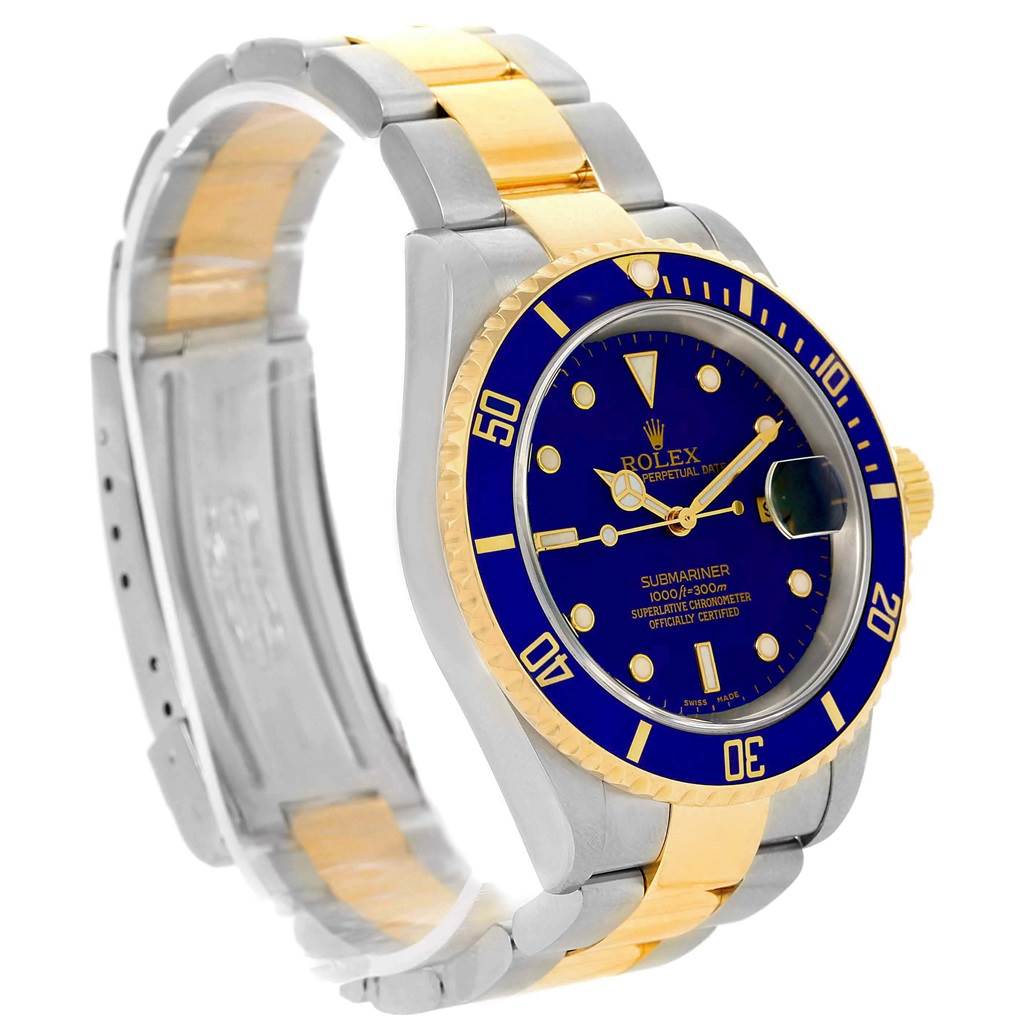The image shows a side-angle view of a Rolex Submariner 16613 Men's Steel and Gold (two tone) Blue Dial 16613 Men's Steel and Gold (two tone) Blue Dial watch, highlighting its blue and gold bezel, dial, and two-tone bracelet.