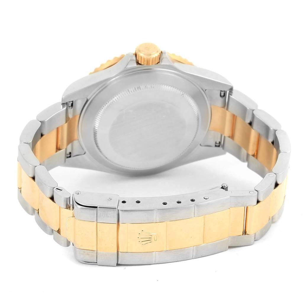 The image shows the back case and bracelet of a Rolex Submariner 16613 Men's Steel and Gold (two tone) Blue Dial 16613 Men's Steel and Gold (two tone) Blue Dial watch, viewed from the rear.