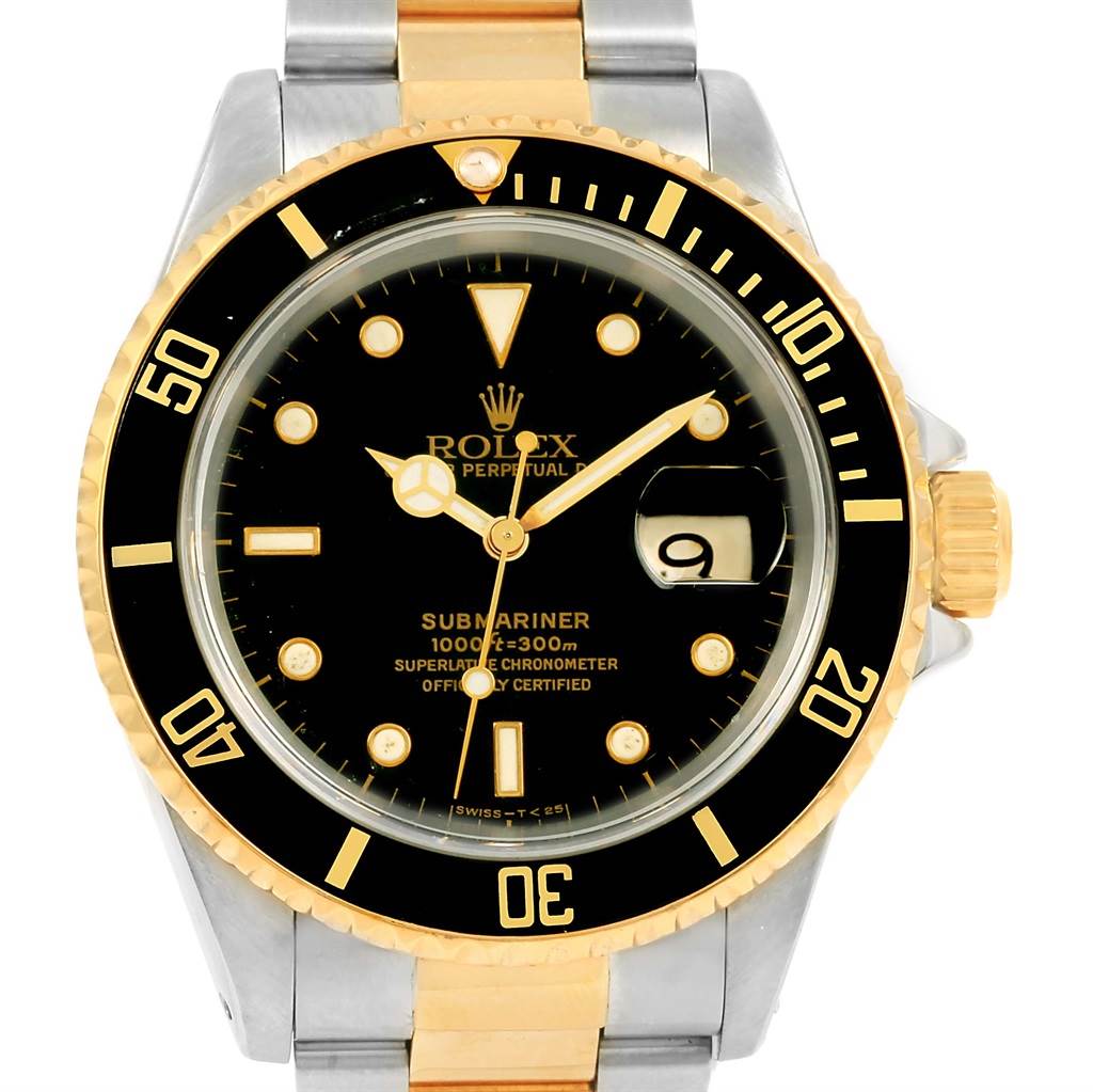 The image shows a front view of a Rolex Submariner 16613 Men
s Steel and Gold (two tone) Black Dial 16613 Men
s Steel and Gold (two tone) Black Dial watch, highlighting its dial, bezel, and part of the bracelet in gold and silver tones.