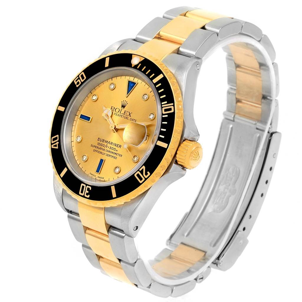 The image shows a Rolex Submariner 16613 Men's Steel and Gold (two tone) Champagne Dial 16613 Men's Steel and Gold (two tone) Champagne Dial watch angled from the front-left, displaying the dial, bezel, crown, and bracelet.