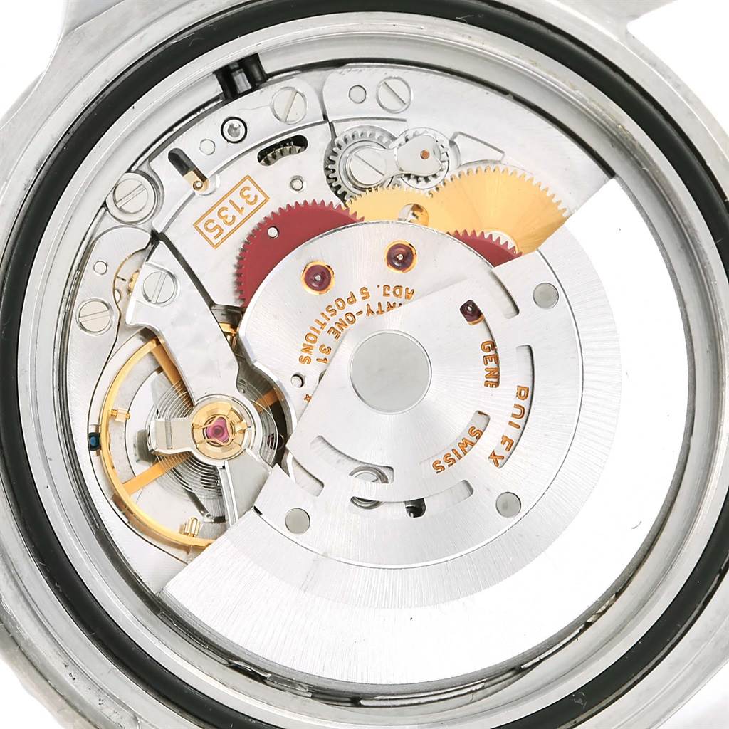 This image shows the internal mechanics of a Rolex Submariner 16610 Men's Stainless Steel Black Dial 16610 Men's Stainless Steel Black Dial watch from a rear view angle.