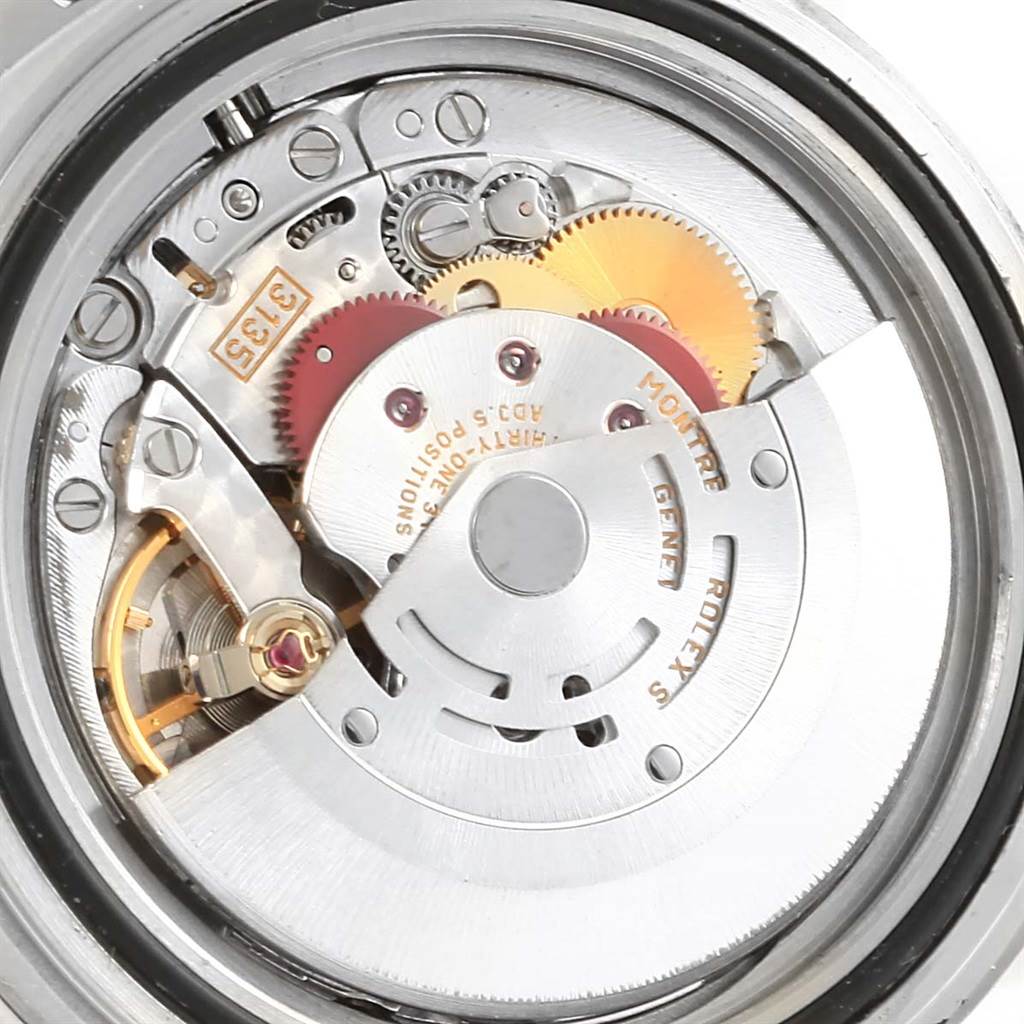 The image shows the intricate internal movement mechanism of the Rolex Submariner 16610 Men's Stainless Steel Black Dial 16610 Men's Stainless Steel Black Dial watch from a close-up, rear angle.