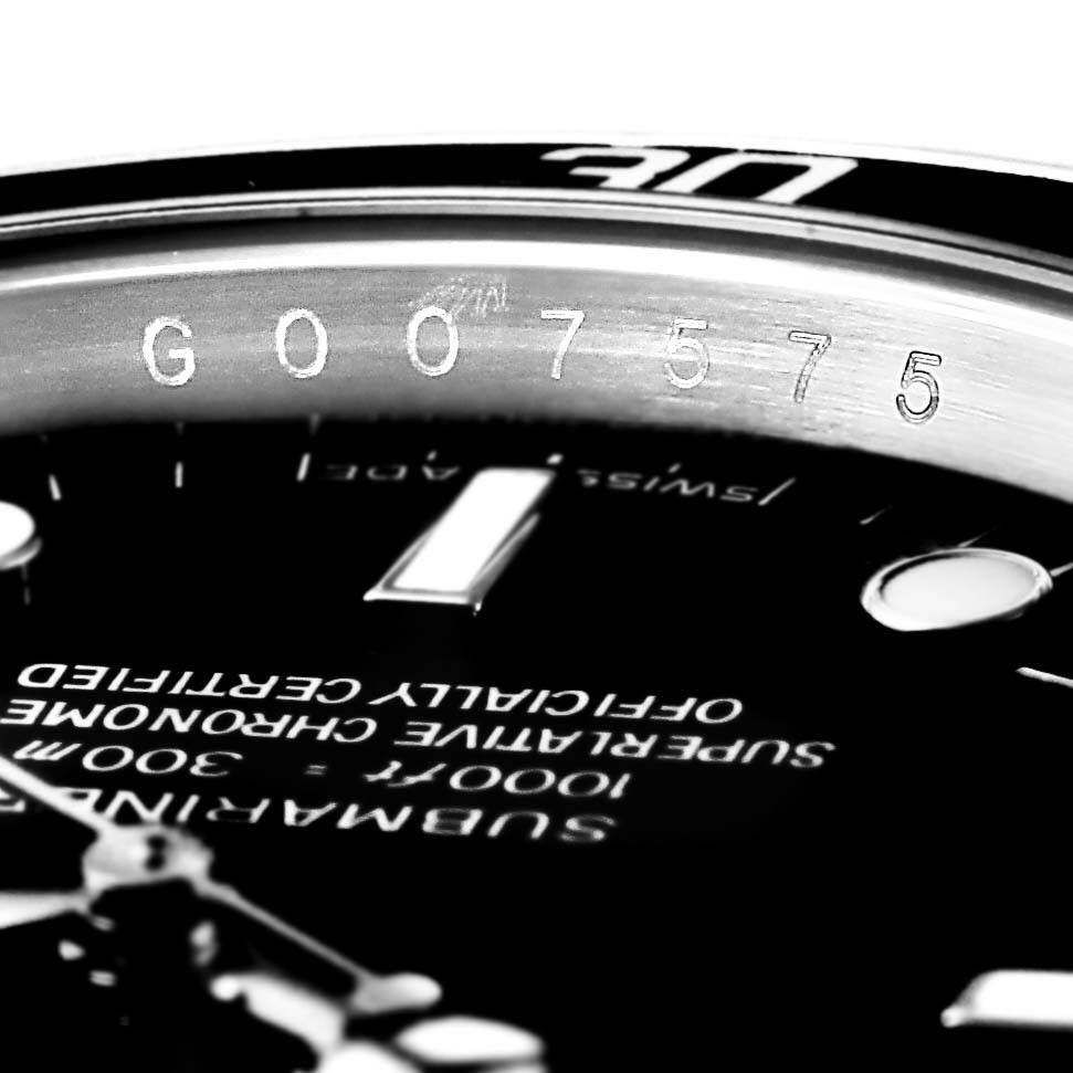 The image shows a close-up angle of the dial and rehaut of a Rolex Submariner 14060 Men's Stainless Steel Black Dial 14060 Men's Stainless Steel Black Dial watch, highlighting the model number and part of the bezel.