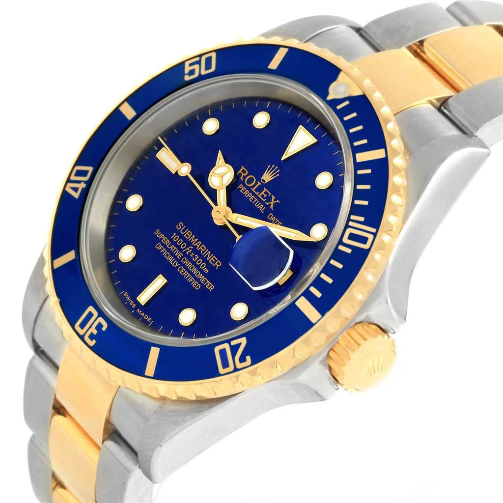 This Rolex Submariner 16613 Men's Steel and Gold (two tone) Blue Dial 16613 Men's Steel and Gold (two tone) Blue Dial watch is shown at a side angle, displaying the bezel, dial, and part of the bracelet.
