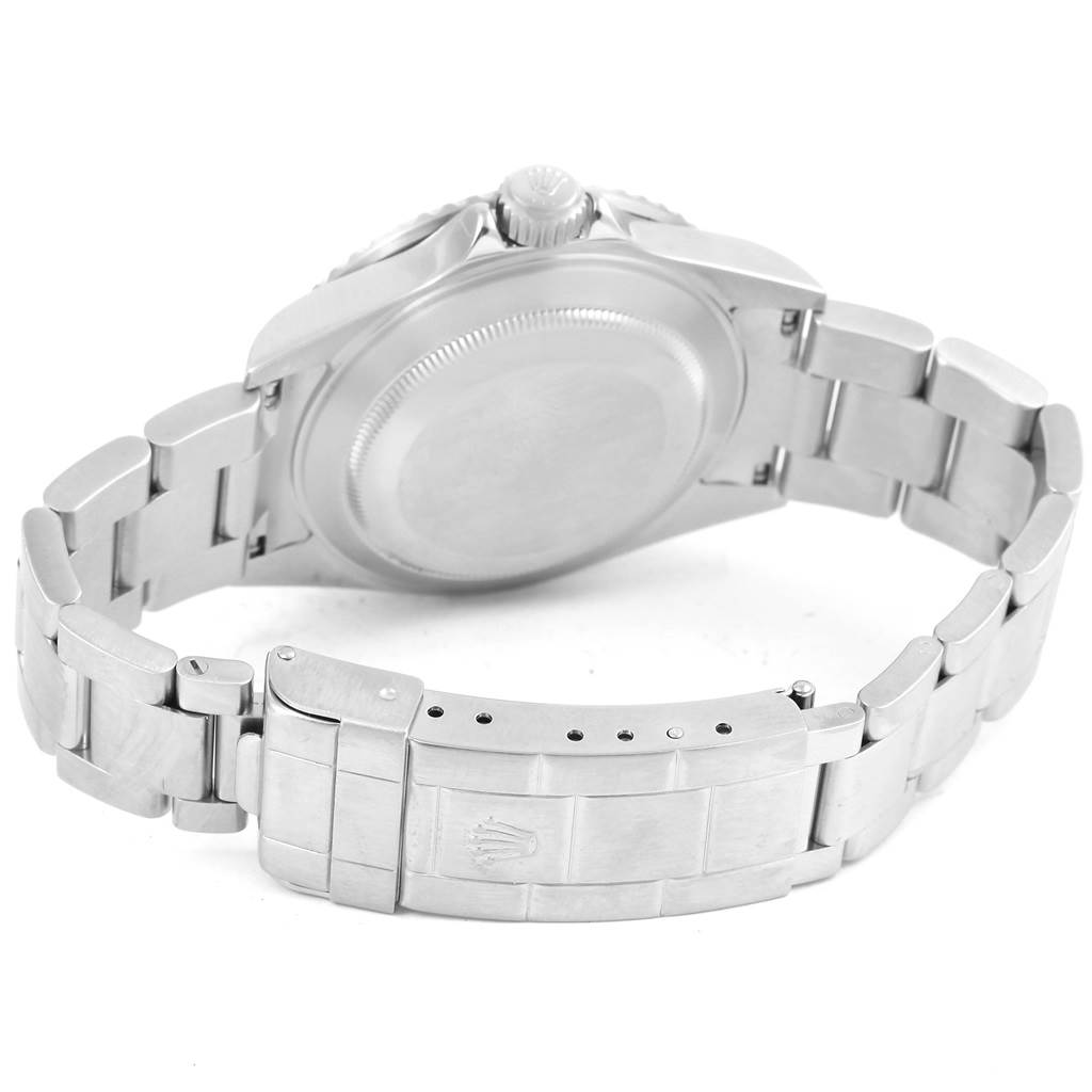 The image shows the back case and clasp of a Rolex Submariner 16610 Men's Stainless Steel Black Dial 16610 Men's Stainless Steel Black Dial watch, viewed from a slightly angled perspective.