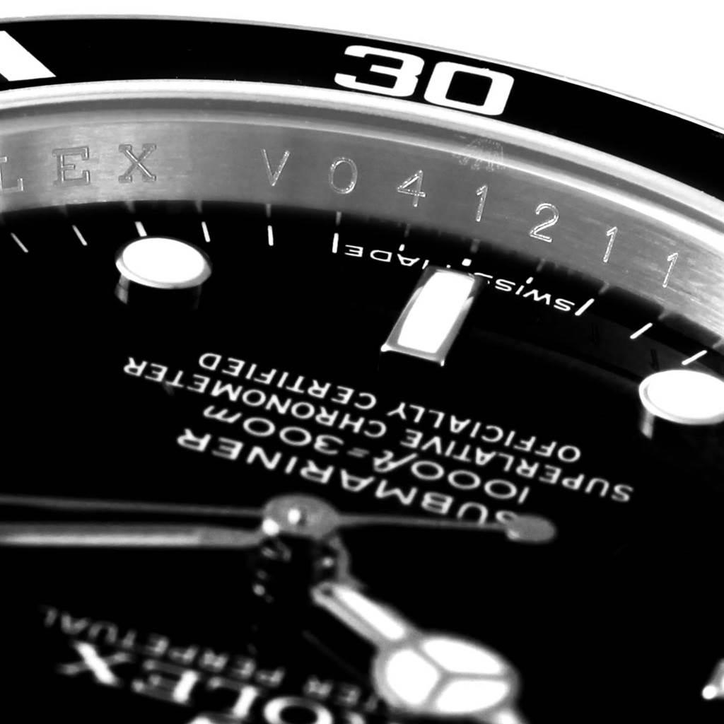 The image shows a close-up of the dial and bezel of a Rolex Submariner 14060 Men's Stainless Steel Black Dial 14060 Men's Stainless Steel Black Dial watch, highlighting the brand name, model details, and part of the case.
