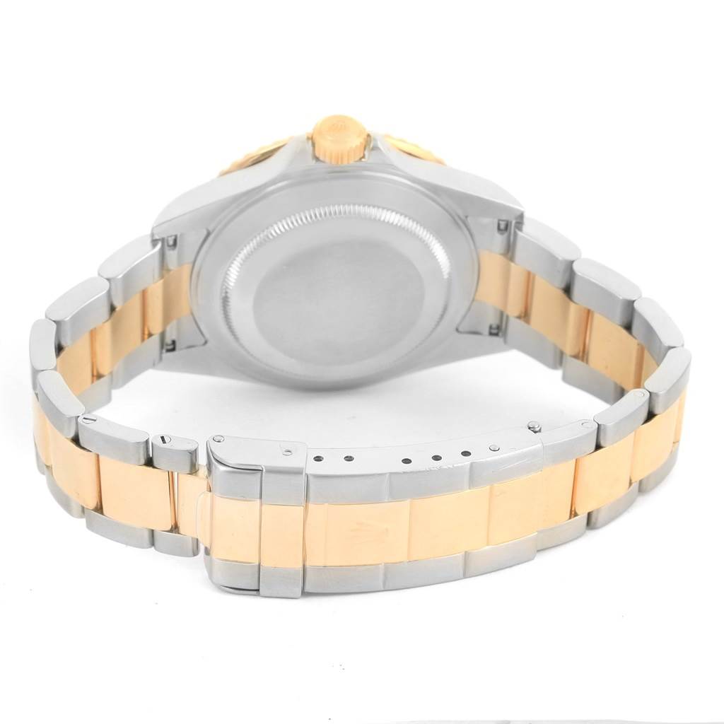 This image shows the back and bracelet of a Rolex Submariner 16613 Men
s Steel and Gold (two tone) Blue Dial 16613 Men
s Steel and Gold (two tone) Blue Dial, taken from a rear angle.