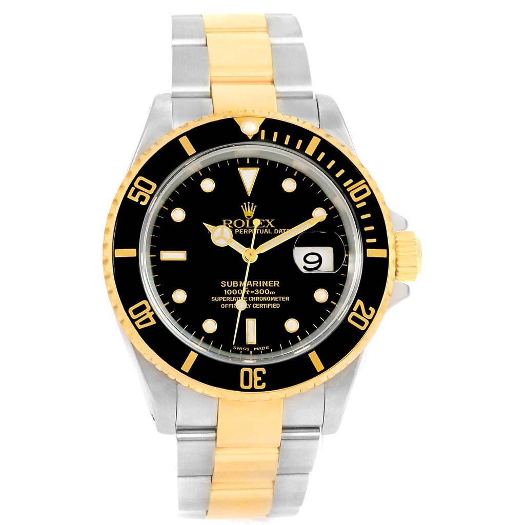 The image shows a front angle of a Rolex Submariner 16613 Men
s Steel and Gold (two tone) Black Dial 16613 Men
s Steel and Gold (two tone) Black Dial watch, showcasing its black dial, date, and two-tone bracelet.