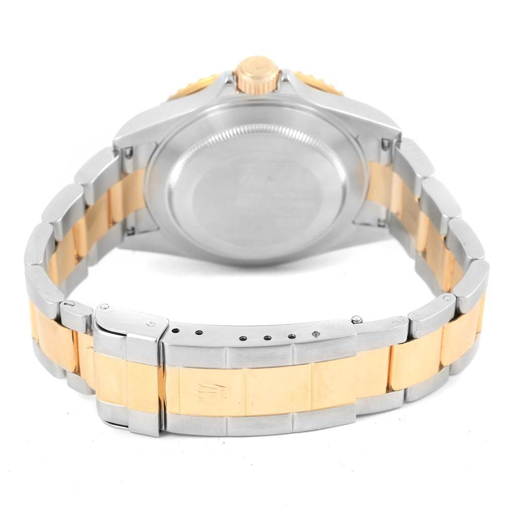 The image displays the back and bracelet of a Rolex Submariner 16613 Men's Steel and Gold (two tone) Blue Dial 16613 Men's Steel and Gold (two tone) Blue Dial watch in a two-tone metal finish.