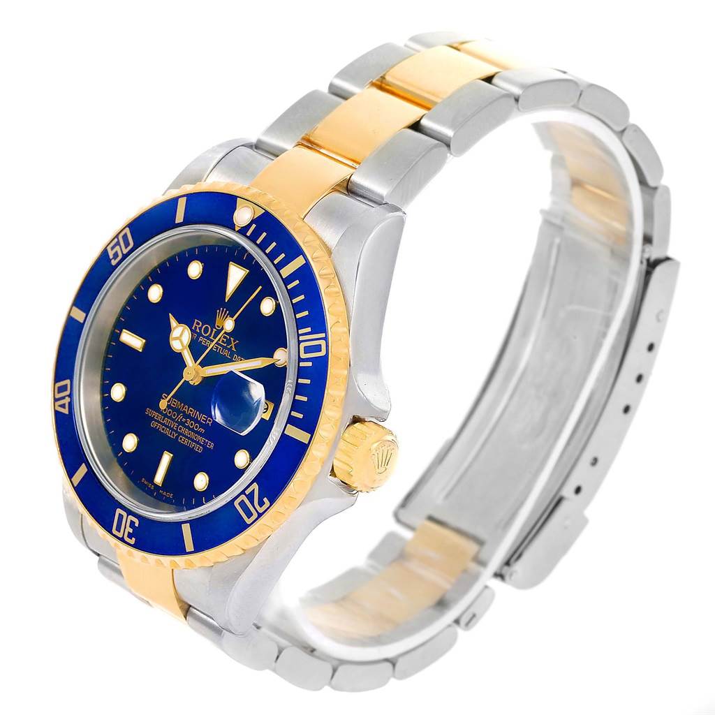 The image shows a Rolex Submariner 16613 Men's Steel and Gold (two tone) Blue Dial 16613 Men's Steel and Gold (two tone) Blue Dial watch at an angled side view, highlighting the band, bezel, crown, and face.