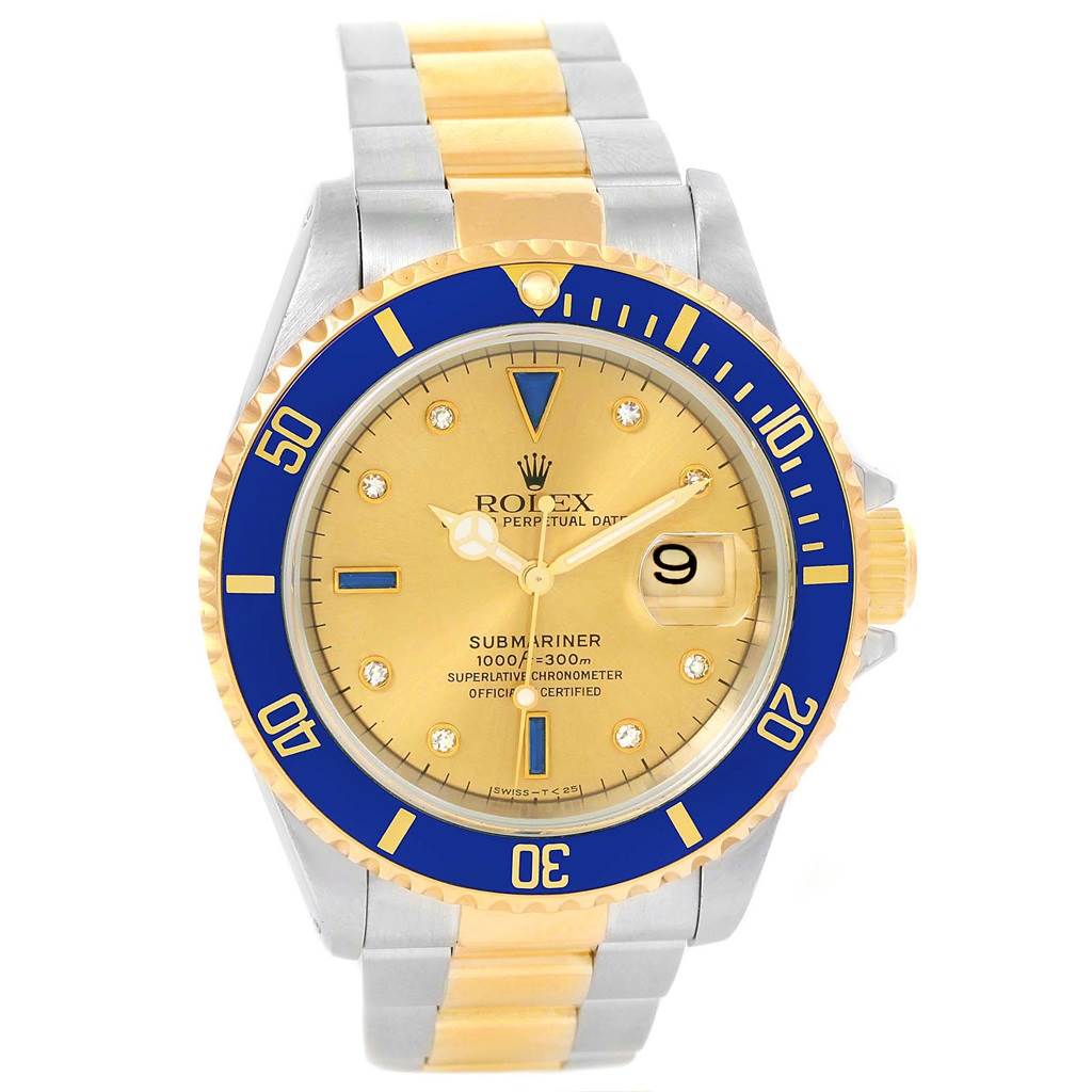 The image shows a front view of a Rolex Submariner 16613 Men's Steel and Gold (two tone) Champagne Dial 16613 Men's Steel and Gold (two tone) Champagne Dial watch with a blue and gold bezel, a gold dial, and a two-tone bracelet.