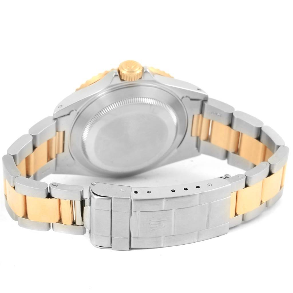 The image shows the back view and the bracelet clasp of the Rolex Submariner 16613 Men's Steel and Gold (two tone) Champagne Dial 16613 Men's Steel and Gold (two tone) Champagne Dial watch.